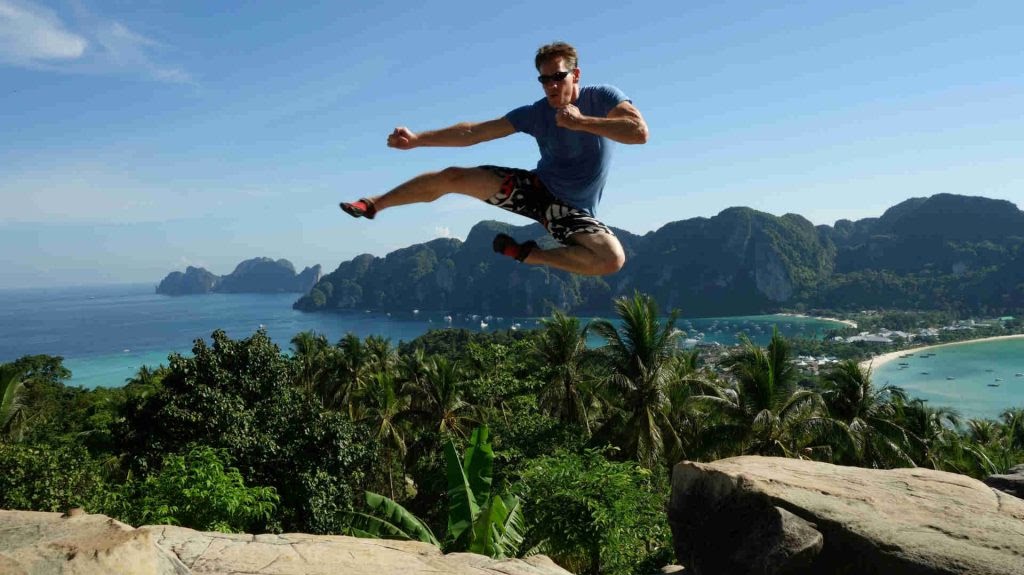 Rick Tew flying kick over Phi Phi island viewpoint